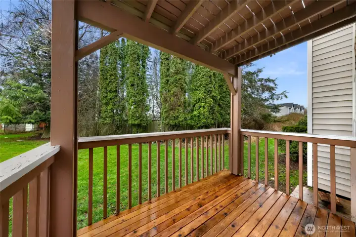 Unit #1 - Back deck looking over green space
