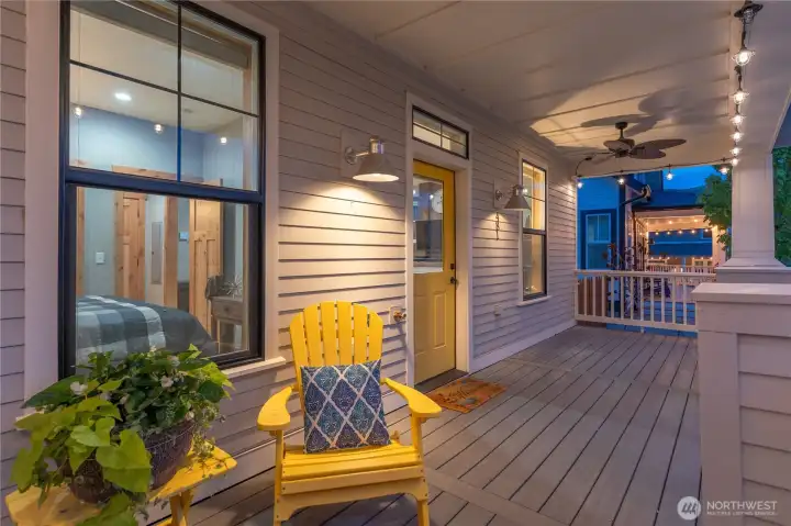 Twilight view of porch fronting Vineyard Park.