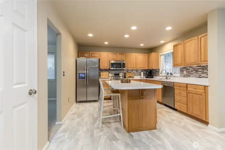 Generous kitchen with excellent storage including a large pantry