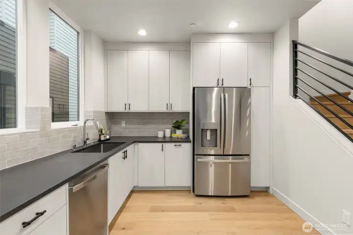 Bright and functional layout with high-end finishes that elevate the daily culinary experience