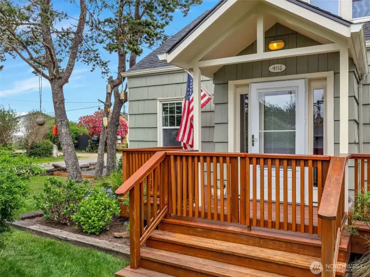 Classic Craftsman entry with covered porch, ideal for enjoying coastal mornings
