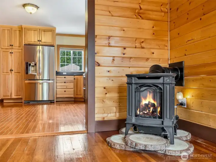 Cozy living room with freestanding stove for added warmth and ambiance