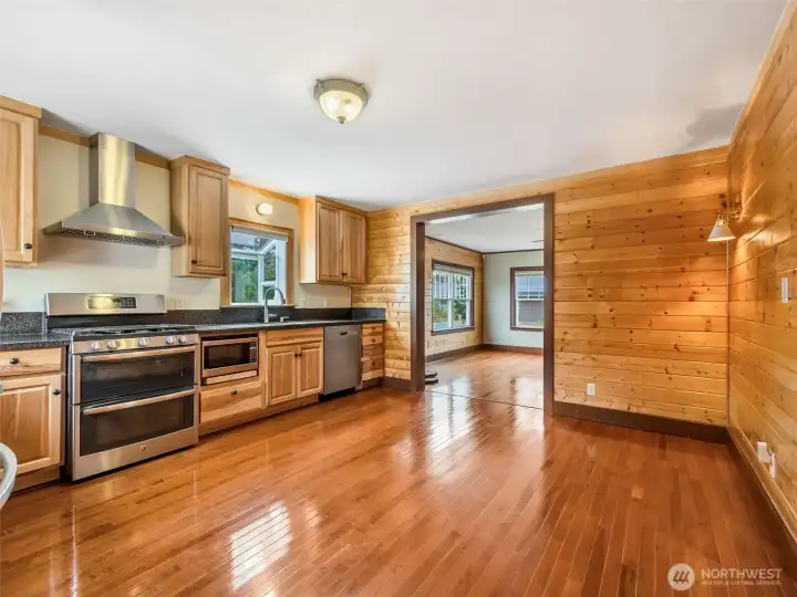 Kitchen with stainless steel appliances and functional layout with room for a large dining table