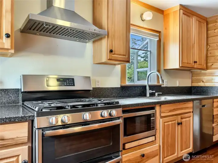 Kitchen with stainless steel appliances and functional layout