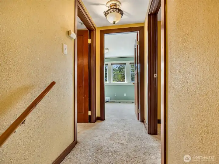 Interior staircase leading to flexible upper-level living space