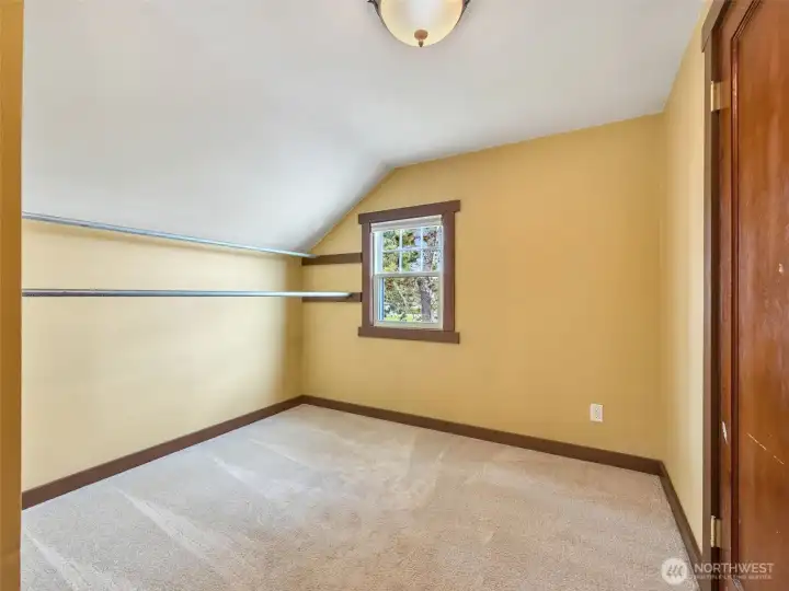 Upstairs bedroom or walk-in closet option connected to primary bath