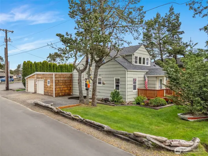 Exterior showing two attached 2-car garages and corner lot setting