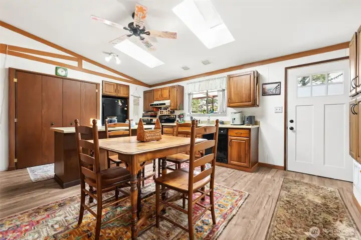Skylights and a ceiling fan perfect for this light and airy space.