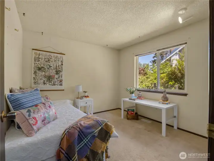 The second bedroom is located at the back of the home. The second bedroom is located at the back of the home.
