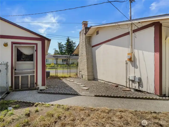 The detached garage is easily accessed from the sliding doors in the kitchen. The detached garage is easily accessed from the sliding doors in the kitchen.
