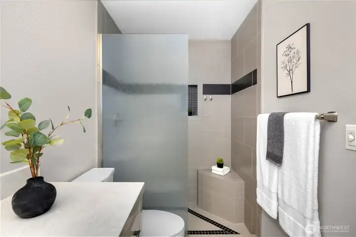 Walk-in shower with custom tilework