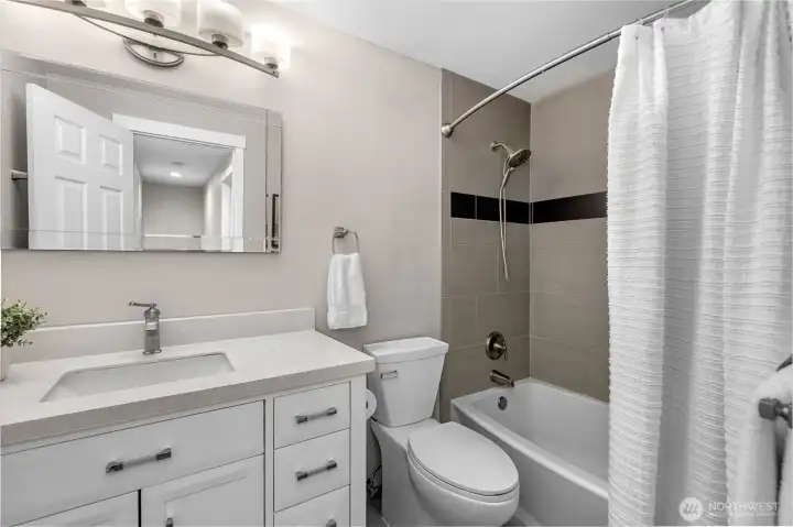 Remodeled full bathroom, again with custom tile work