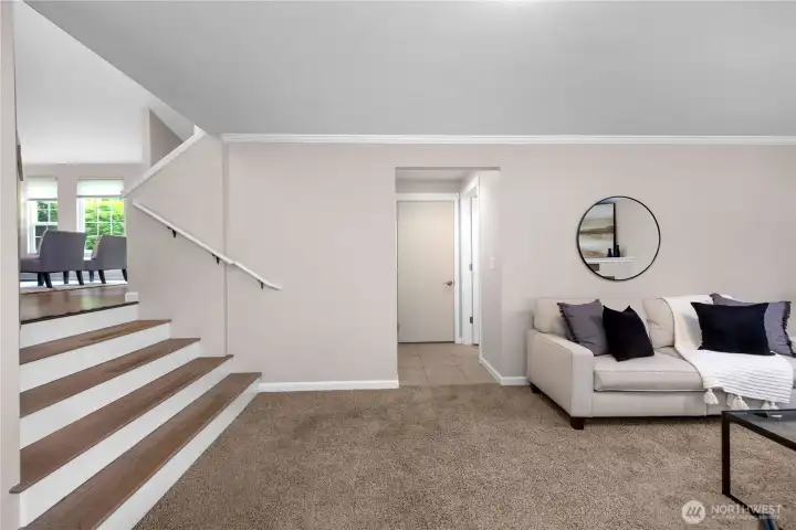 Family room entrance to utility room, half bath and garage.