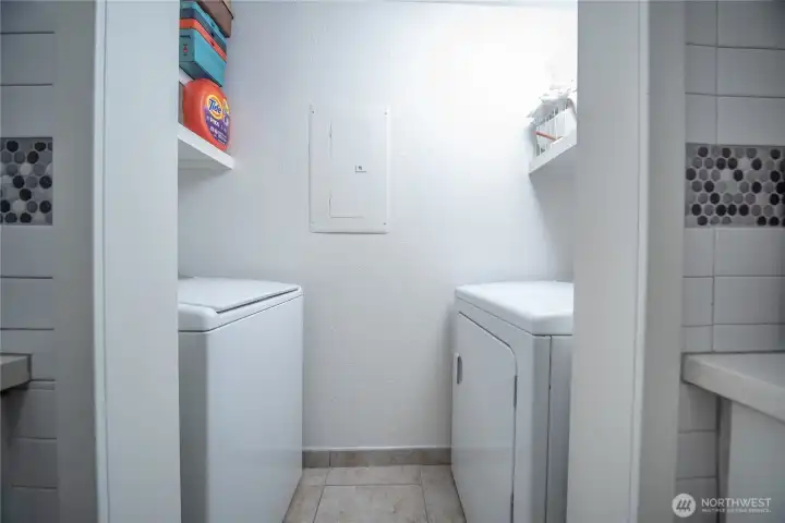 Dedicated in-unit laundry room with full-sized washer & dryer