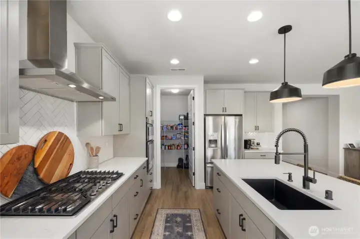 Large walk-in pantry conveniently located right off the kitchen