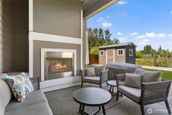 Enjoy summer evenings on this extended patio with gas fireplace