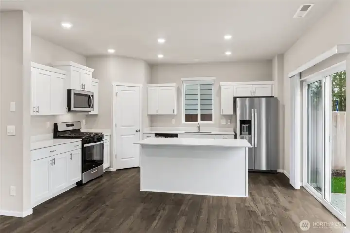 Photo rendering is representational and may be virtually staged. Actual home is under construction and finishes, elevation, and paint colors may vary. See site agent for details.
