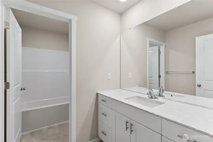 Photo rendering is representational and may be virtually staged. Actual home is under construction and finishes, elevation, and paint colors may vary. See site agent for details.