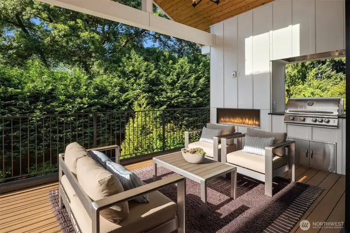 Covered outdoor living room with fireplace Covered outdoor living room with fireplace