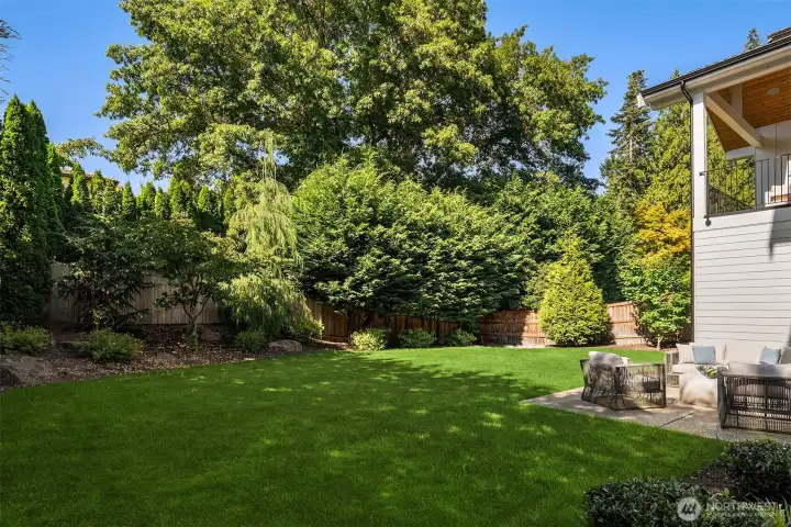 Large, level, fully fenced backyard. Large, level, fully fenced backyard.