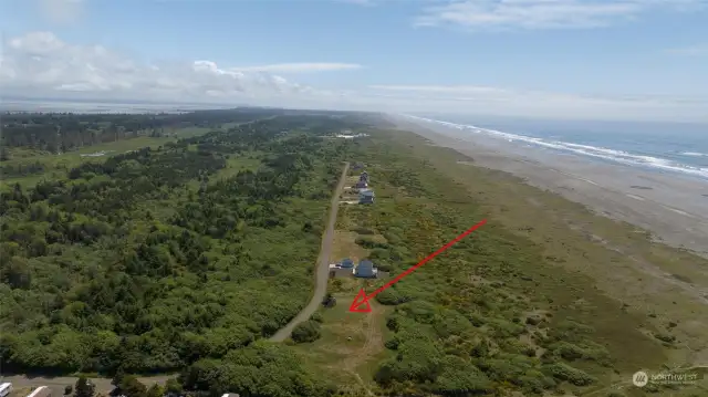 Arrow indicates the approximate building site on the property.