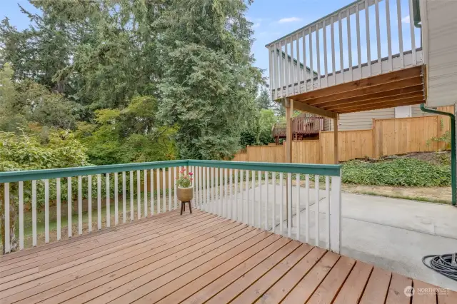 Part of rear deck access from Laundry Room or Kitchen slider.  Looking at upper deck  and patio below