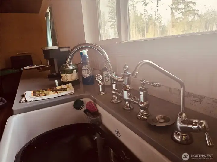 Farm sink with nickle fixtures