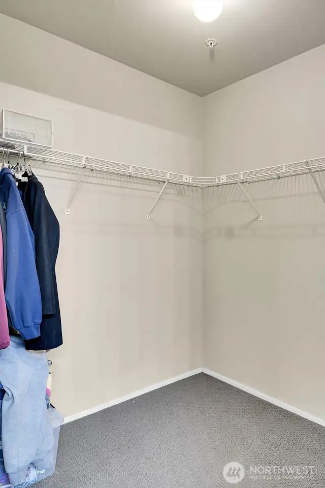 Primary bedroom walk-in closet.