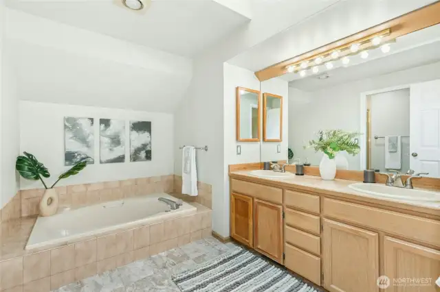 Primary bath with new flooring.