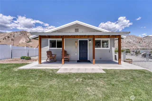 Bauers Landing offers inviting curb appeal with a cozy covered porch, wood beam accents,perfect for relaxing and soaking in the dramatic mountain views.
