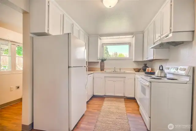 A cheerful kitchen space with natural light and everyday practicality