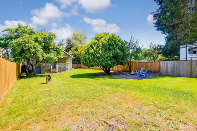 Fully fenced yard with room to garden, play, or unwind