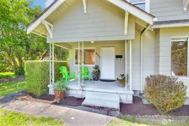 Front yard greenery and classic lines add to the home’s warm personality    Room to relax and entertain by the fire pit area in the backy