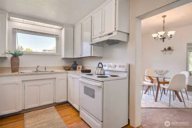 Bright kitchen with easy access to dining and laundry areas