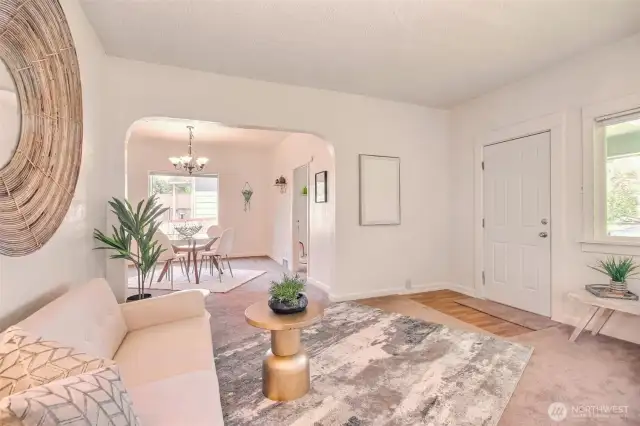 Vintage-style arch adds character between living and dining rooms
