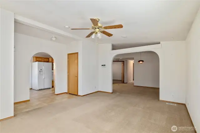 Large Living room with easy views of Dining Room & Kitchen.