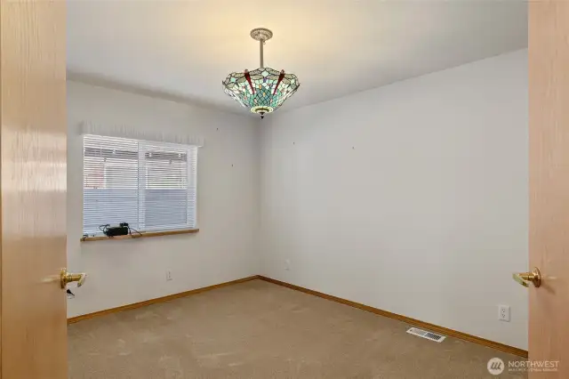 Double door bedroom or office space.