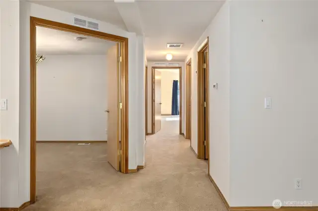 Primary bedroom is at the end of the hall.