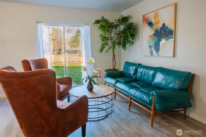 Sliding Glass Doors open up to a HUGE Level & Fully Fenced Backyard.