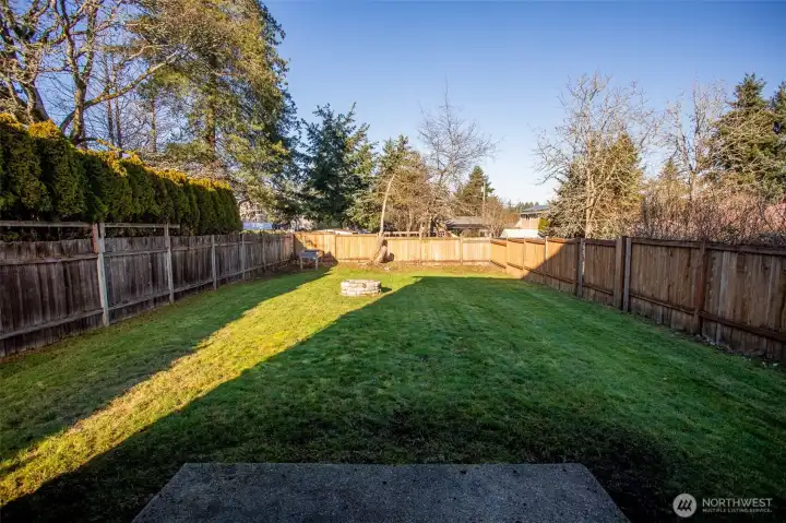 Huge Level Backyard that is completely fenced.