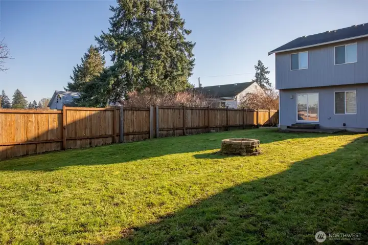Another view of the Huge Level Backyard that is completely fenced.