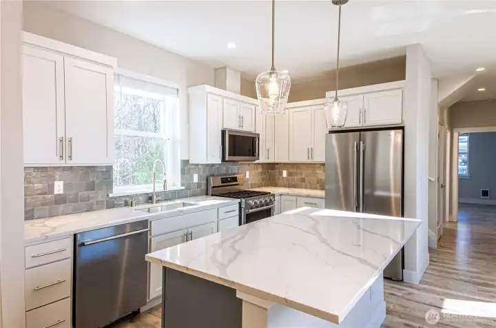 Choose from our large selection of artisan tile and quartz countertops. *Previous build