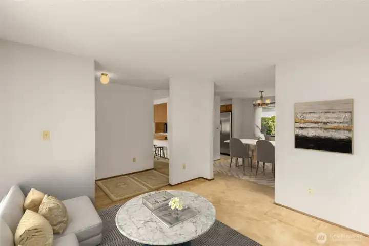 Just inside the entry. Virtual staged sitting room/living room