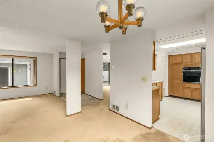 Dining room looking into kitchen and sitting room.