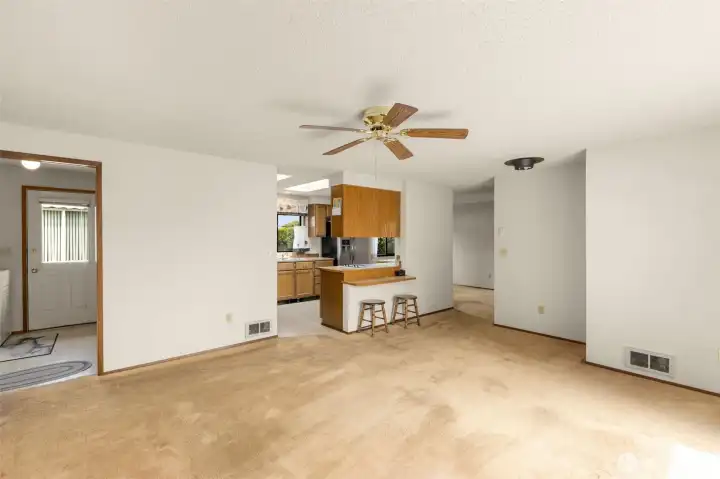 Great room/living room looking towards kitchen and eating bar.