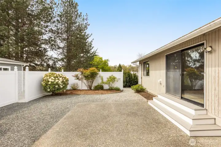 Private Patio with easy maintenance gardens
