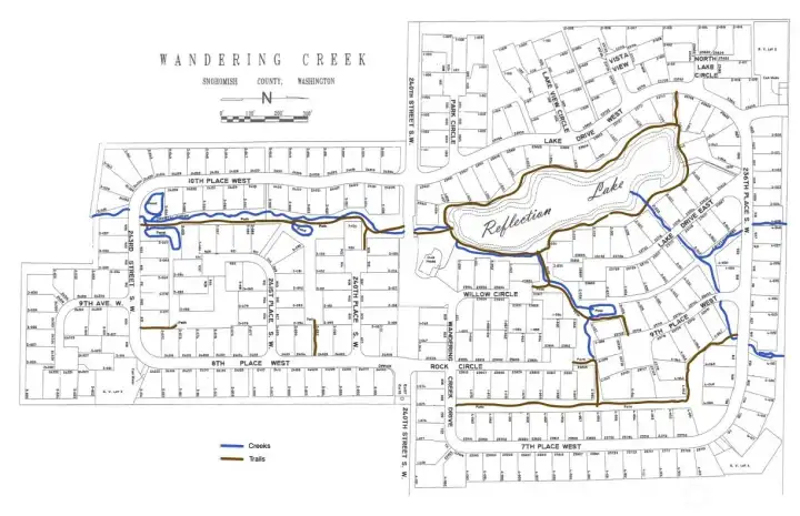 Your new neighborhood with creeks, lake and trails.