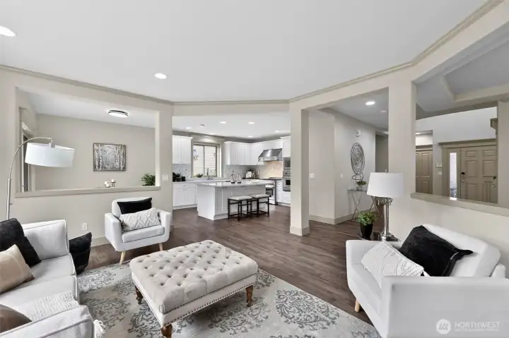 The family room, eating nook, and the kitchen all flow seamlessly providing true open-concept living!