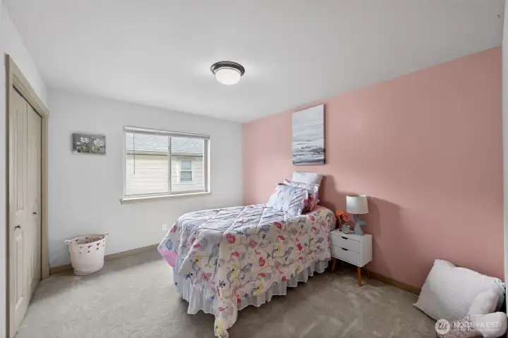 Second spacious guest bedroom. All guest bedrooms have  new carpet that is throughout the home!