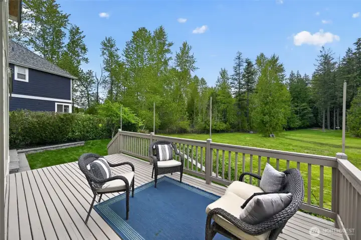 Situated on a quiet neighborhood street, this home features a sought-after backyard, entertaining deck surrounded by lush landscaping.